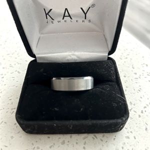 8mm wedding band crafted of tungsten carbide.